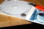 The glue was sticky enough that once I cut through it, it would stick back together once the knife was gone.  This, like most problems, could be solved by throwing more money at it.