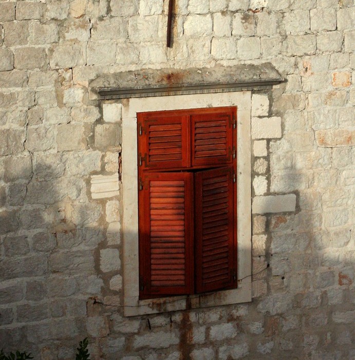 WoodWindowStoneWall.jpg